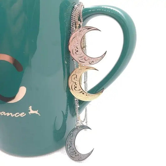 Ease Moon shaped pendant